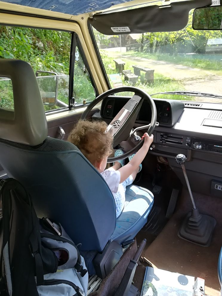 Baby behind the steering wheels